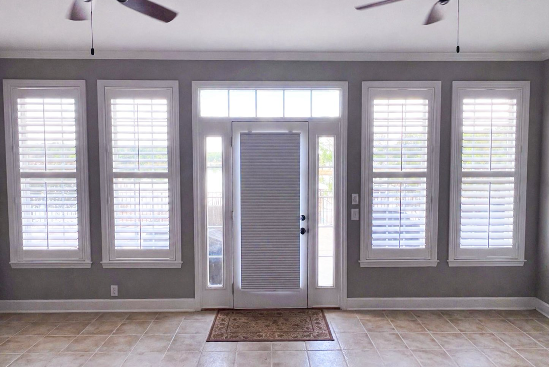After: polyresin shutters framing the Lake Wateree view