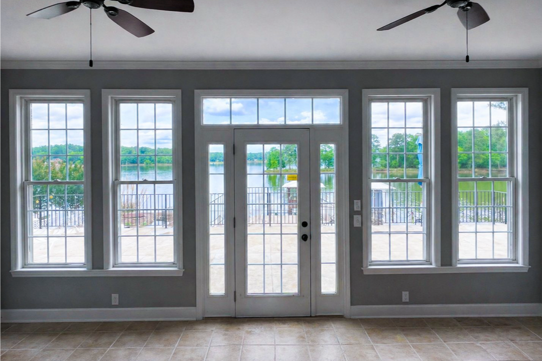 Before: uncovered lakefront windows at Lake Wateree
